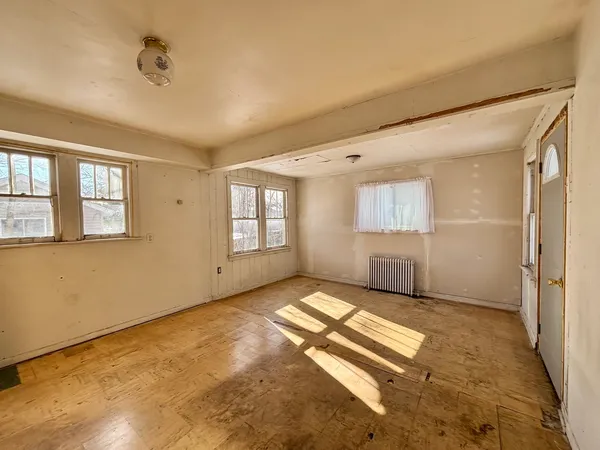 a view of an empty room and window