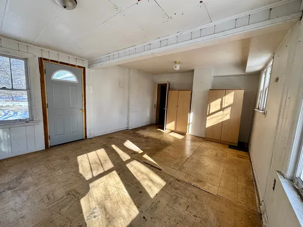 a view of an empty room and window