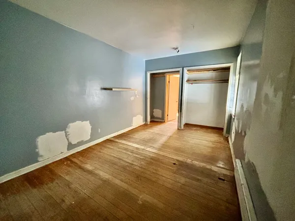 a view of a livingroom with a staircase