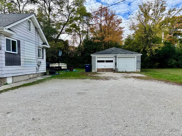 a house with trees in front of it