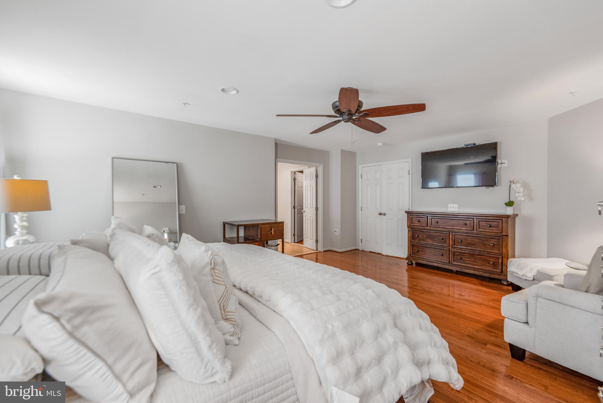 9709 Traver Street Bowie, MD 20721 - Photo 24 of 48 Spacious, main serene bedroom with warm tones.