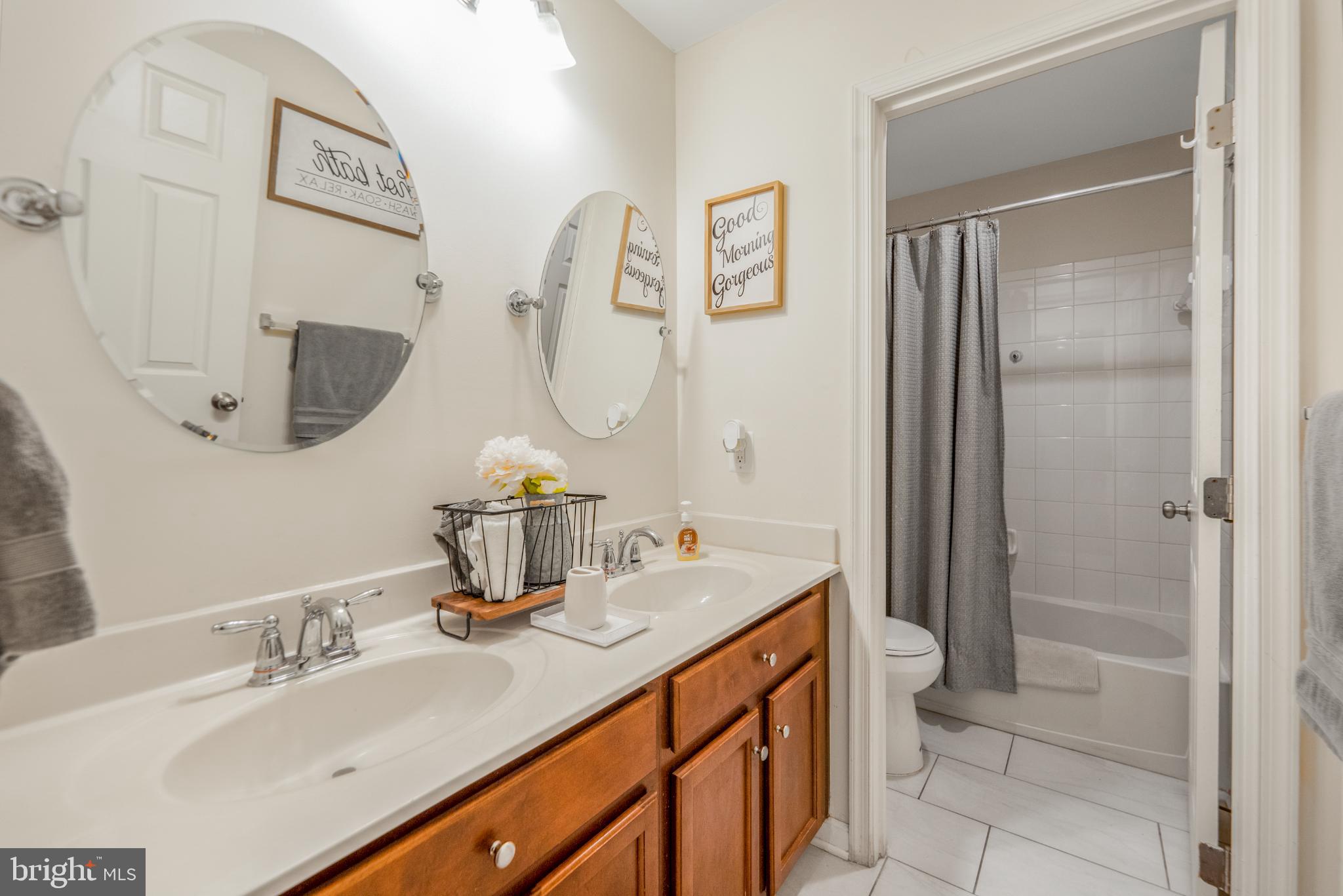9709 Traver Street Bowie, MD 20721 - Photo 32 of 48 Charming upper level bathroom with modern touches.