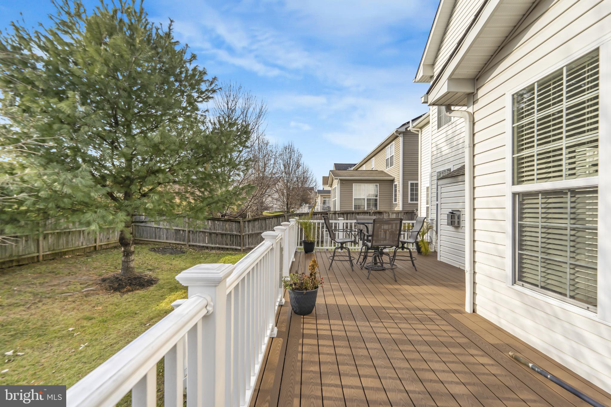 9709 Traver Street Bowie, MD 20721 - Photo 43 of 48 Sunny deck with serene backyard views.