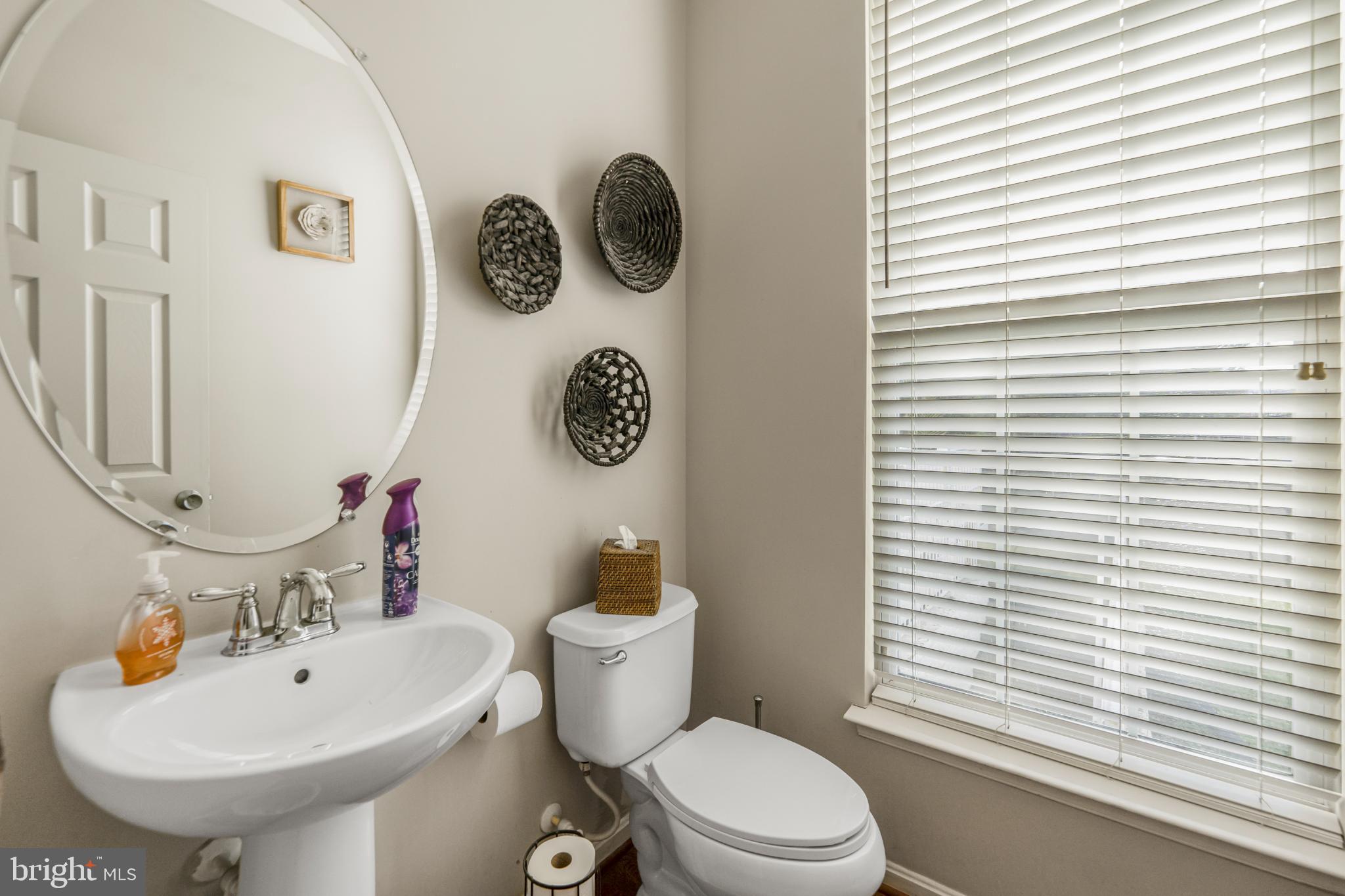 9709 Traver Street Bowie, MD 20721 - Photo 8 of 48 Charming 1/2 Bath on main level modern accents.