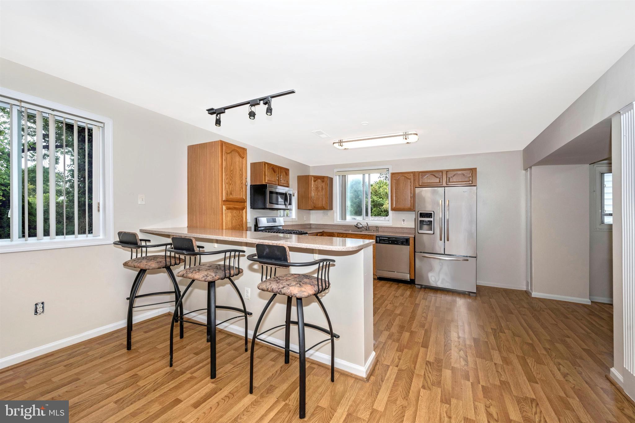 12607 Epping Road Silver Spring, MD 20906 - Photo 11 of 39 Kitchen w/new stainless steel appliances