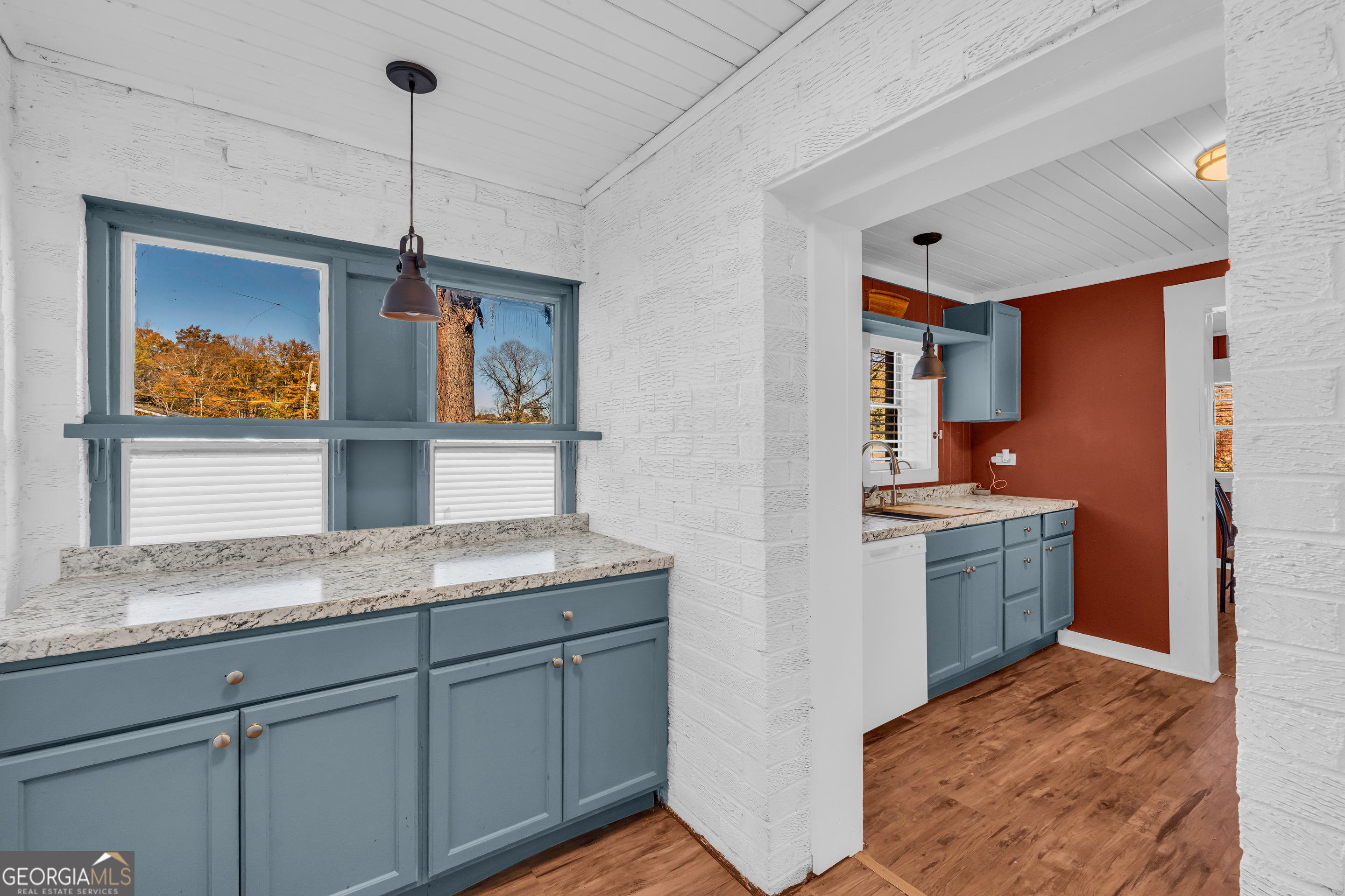 288 South Broad Street Toccoa, GA 30577 - Photo 16 of 23 a kitchen with a sink stove and refrigerator