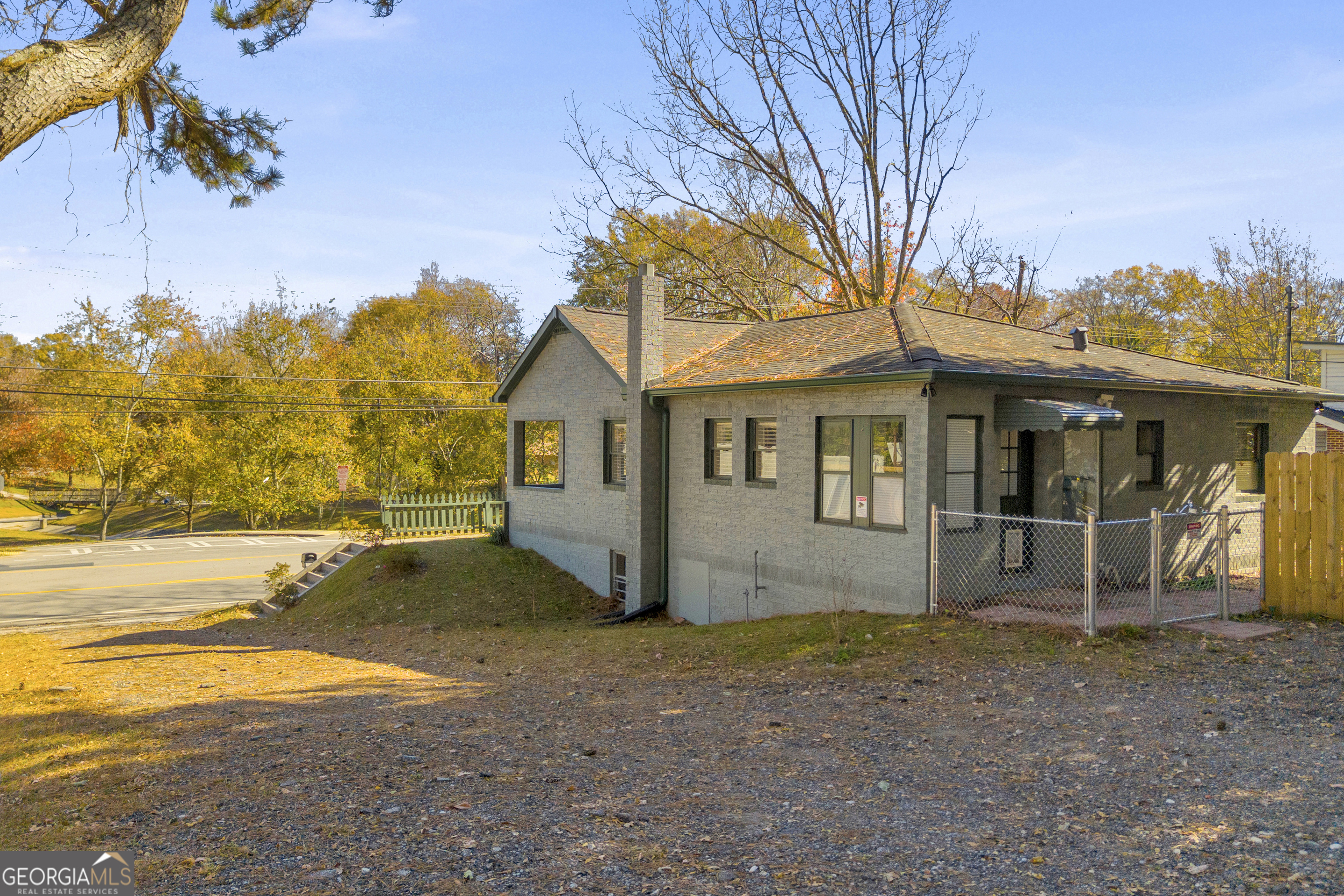 288 South Broad Street Toccoa, GA 30577 - Photo 21 of 23 a view of a house with backyard and trees