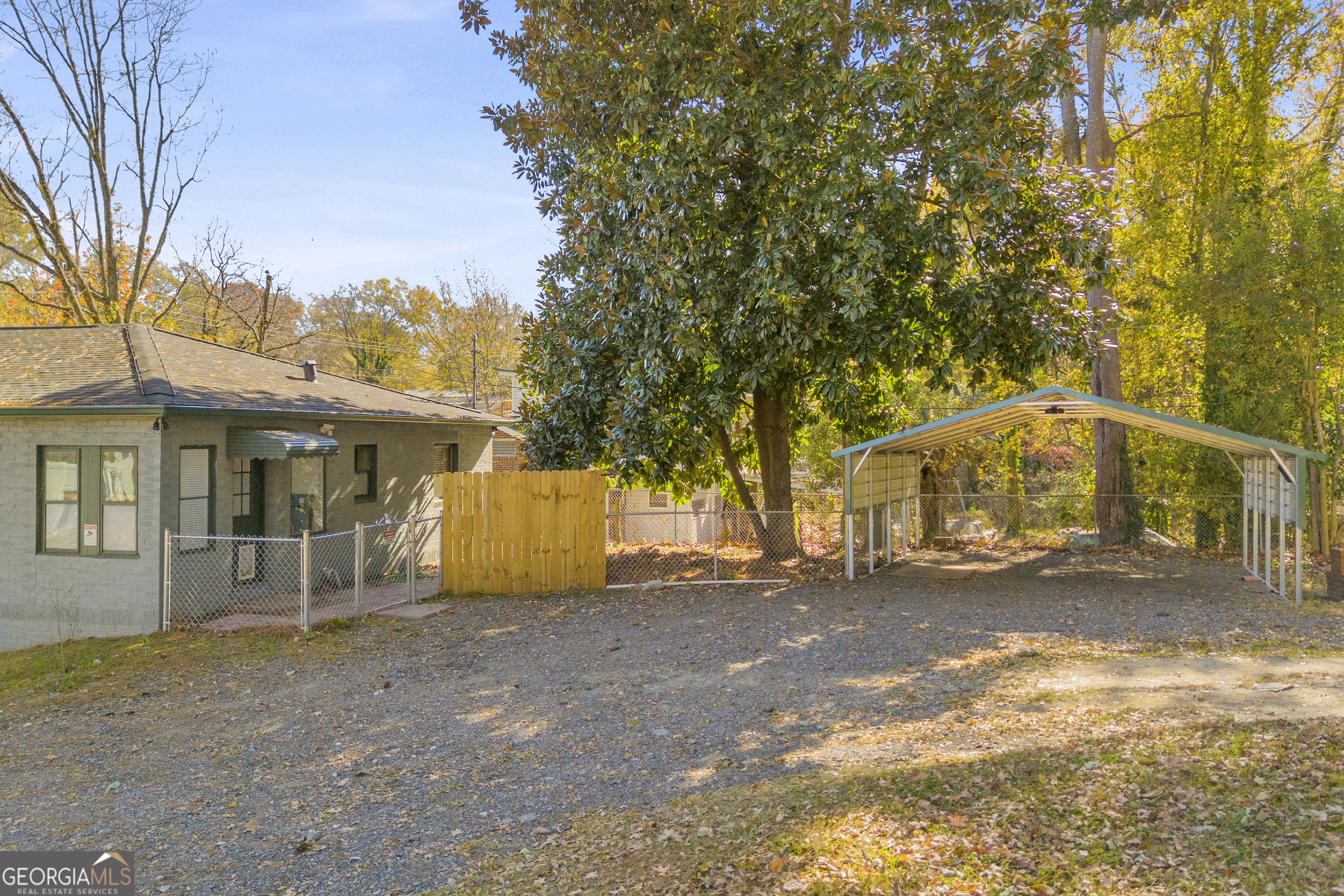 288 South Broad Street Toccoa, GA 30577 - Photo 22 of 23 a view of a large building with large trees and plants