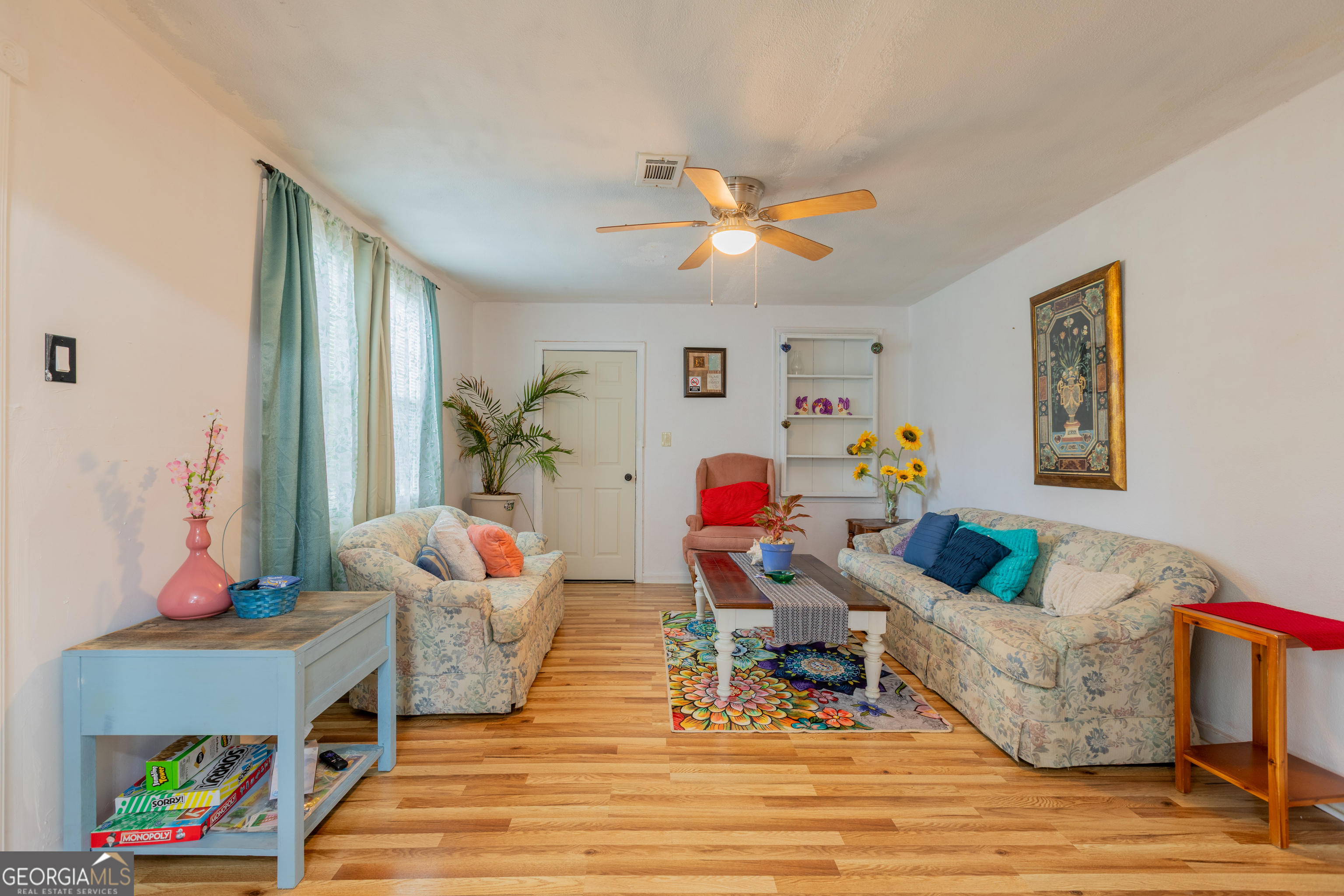 1103 Calvin Avenue Columbus, GA 31903 - Photo 4 of 15 a living room with furniture and wooden floor