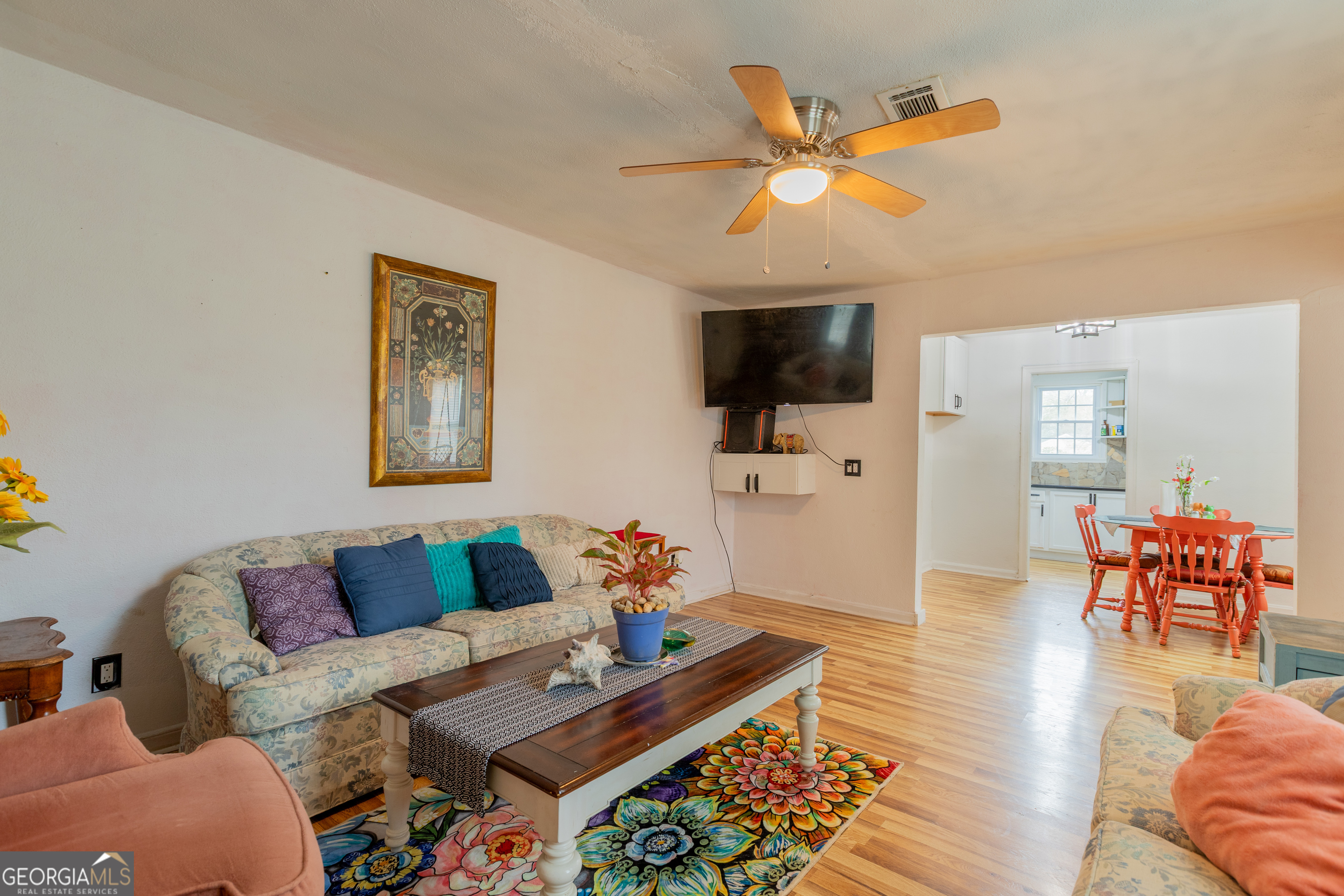1103 Calvin Avenue Columbus, GA 31903 - Photo 5 of 15 a living room with furniture and a flat screen tv