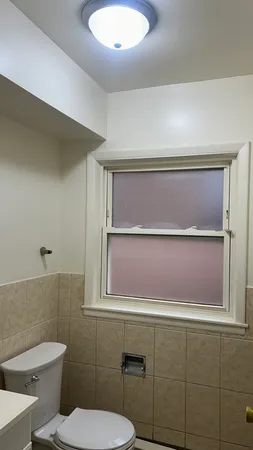 a bathroom with a toilet