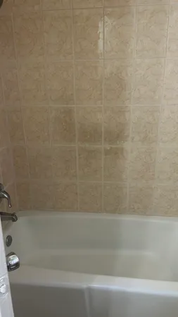 a bathroom with a bathtub