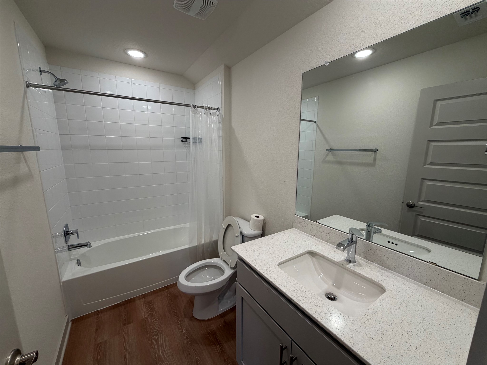 10708 Gonzales Ranger Pass Austin, TX 78754 - Photo 33 of 40 A well-appointed bathroom features a sleek vanity, contemporary fixtures, and durable flooring for daily comfort.
