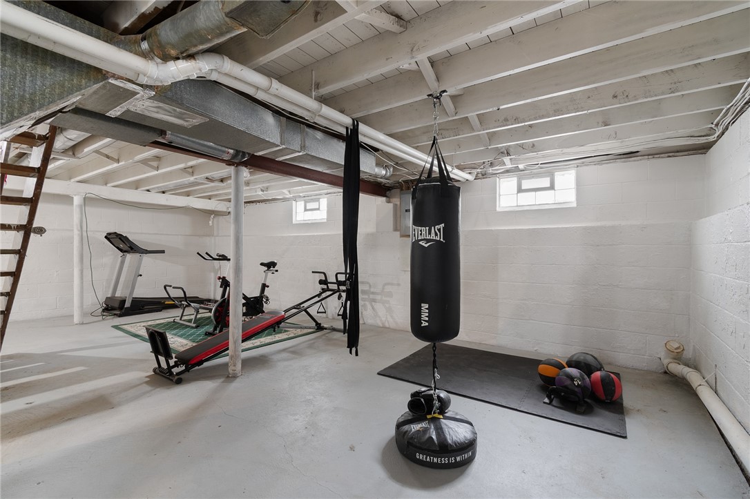 544 Glenview Court Webster, NY 14580 - Photo 22 of 31 The CLEAN and DRY basement is currently a GYM SPAC