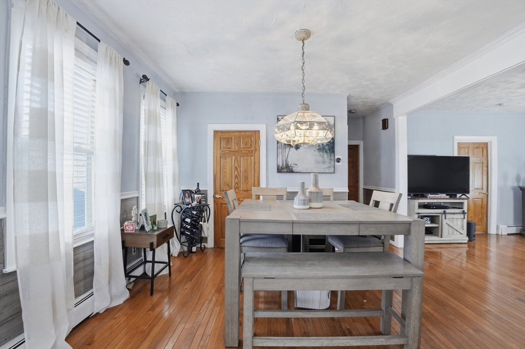 203 South Main Street Acushnet, MA 02743 - Photo 12 of 34 a view of living room with furniture and wooden floor