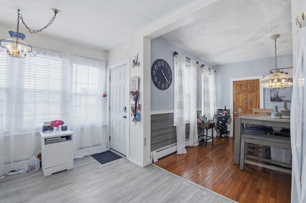 203 South Main Street Acushnet, MA 02743 - Photo 15 of 34 a view of livingroom with furniture and wooden floor
