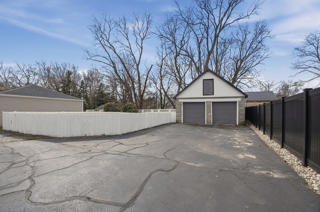 203 South Main Street Acushnet, MA 02743 - Photo 2 of 34 a view of house with trees in front of it