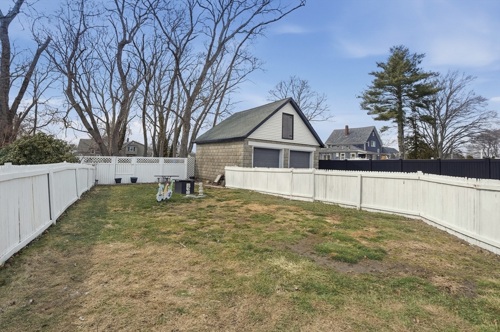 203 South Main Street Acushnet, MA 02743 - Photo 25 of 34 a view of white house with a yard