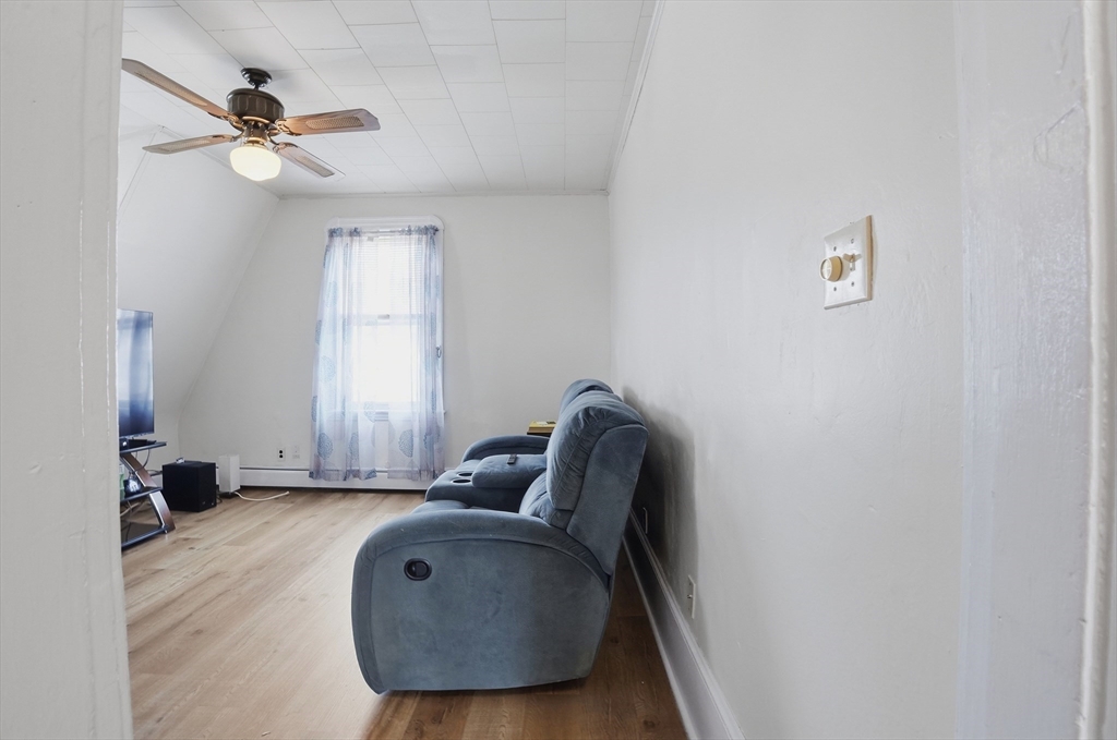 203 South Main Street Acushnet, MA 02743 - Photo 27 of 34 a living room with furniture and a window