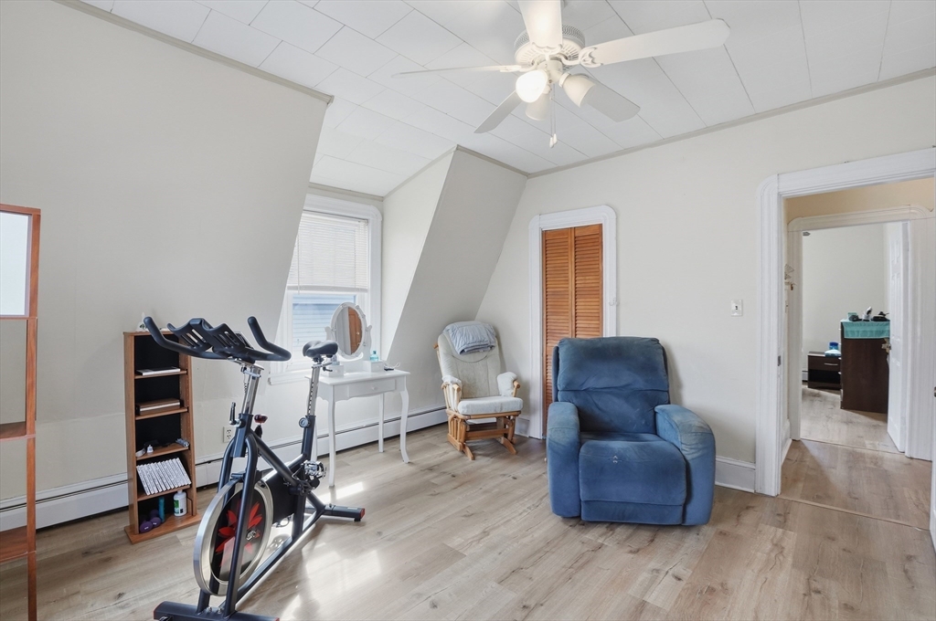 203 South Main Street Acushnet, MA 02743 - Photo 30 of 34 a living room with furniture and a wooden floor