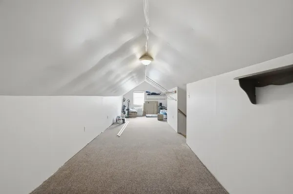 a very nice looking room with a ceiling fan