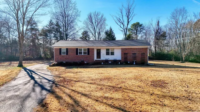 a view of a house with a swimming pool