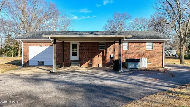 a view of a house with a large window