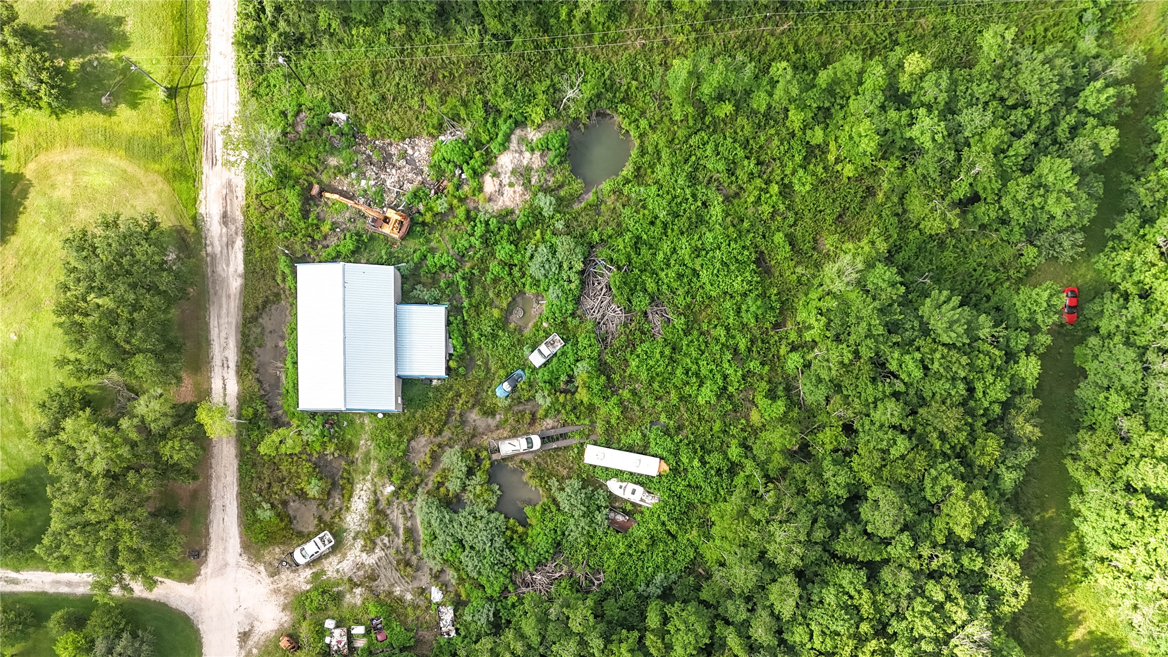 19650 Webb Alvin, TX 77511 - Photo 18 of 19 a backyard of a house with a garden and plants