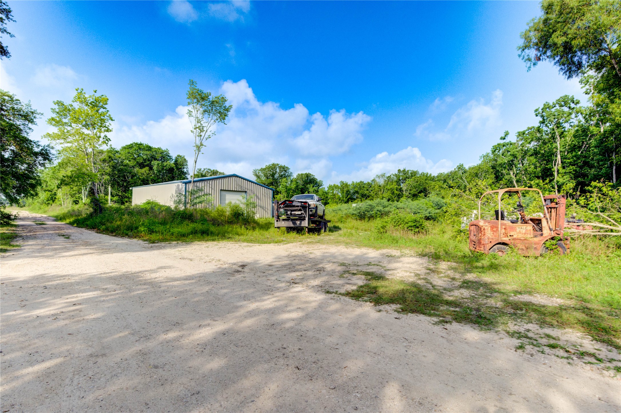 19650 Webb Alvin, TX 77511 - Photo 2 of 19 a street view with garden
