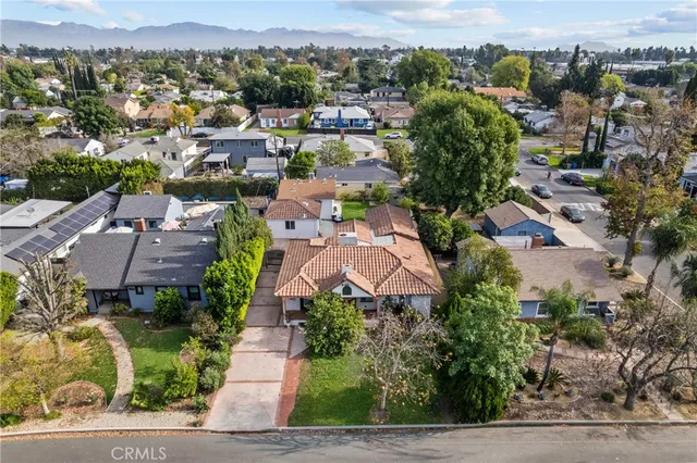 an aerial view of a city with lots of residential buildings