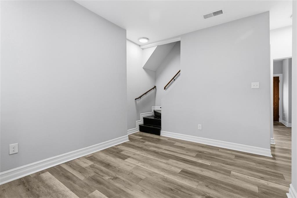 714 Cherokee Street Pittsburgh, PA 15219 - Photo 11 of 26 a view of empty room with wooden floor