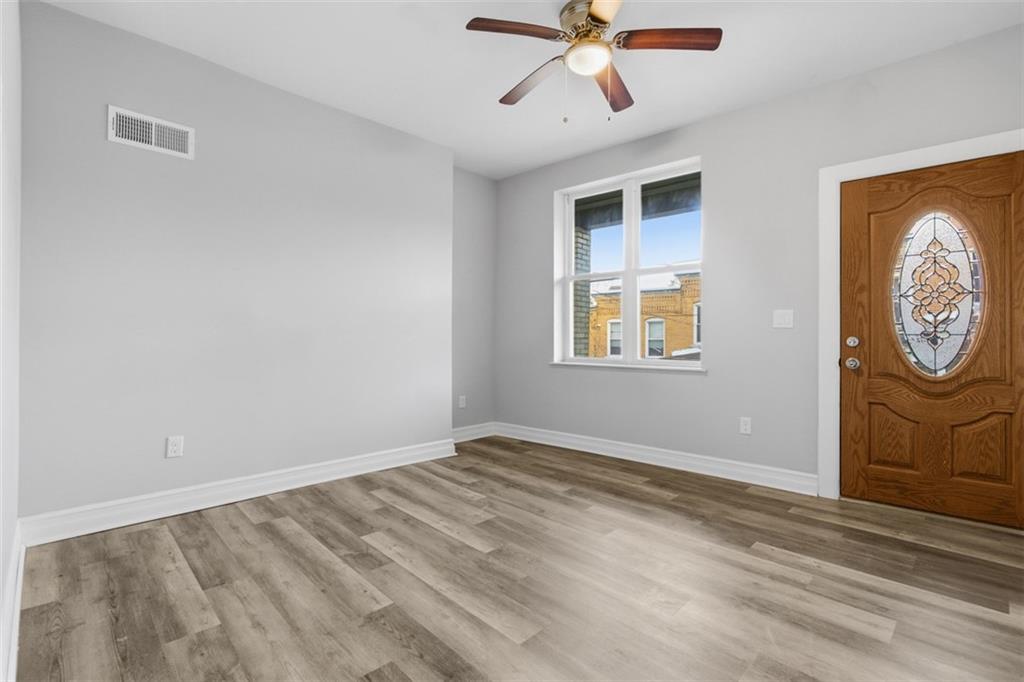 714 Cherokee Street Pittsburgh, PA 15219 - Photo 12 of 26 a view of an empty room with a window