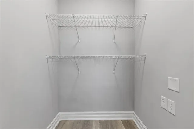 a view of a room with racks on the wall