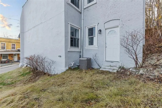 a view of a backyard of a house