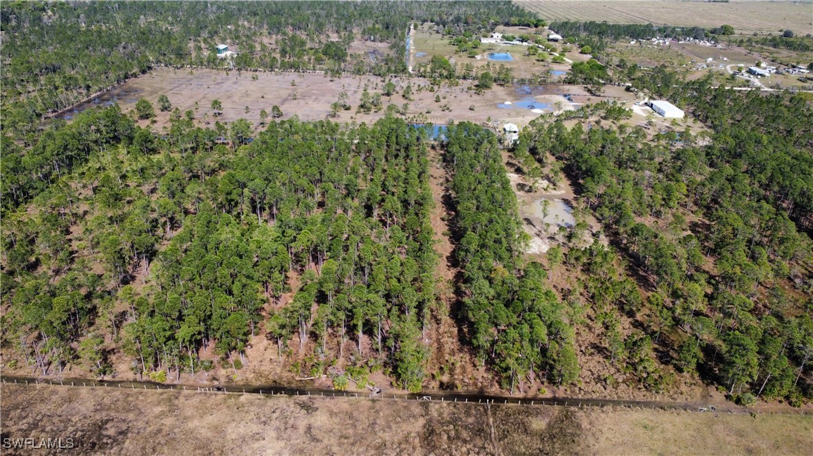 46920 A Bermont Road Punta Gorda, FL 33982 - Photo 11 of 40 an aerial view of residential house with outdoor space