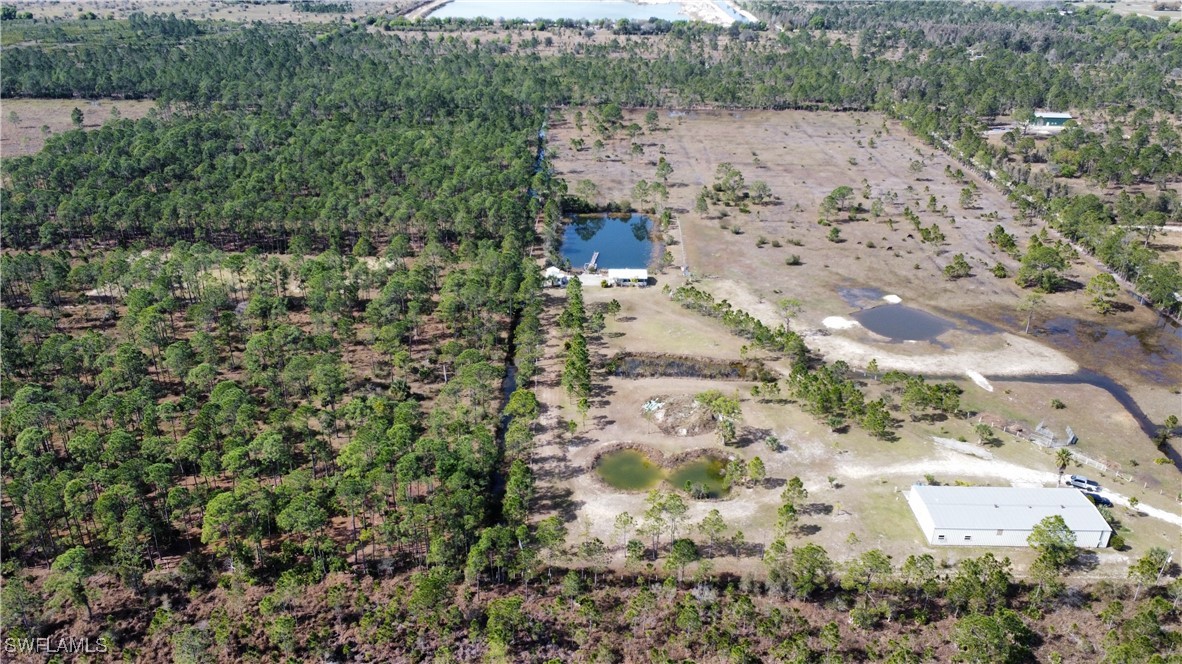 46920 A Bermont Road Punta Gorda, FL 33982 - Photo 24 of 40 an aerial view of house with outdoor space