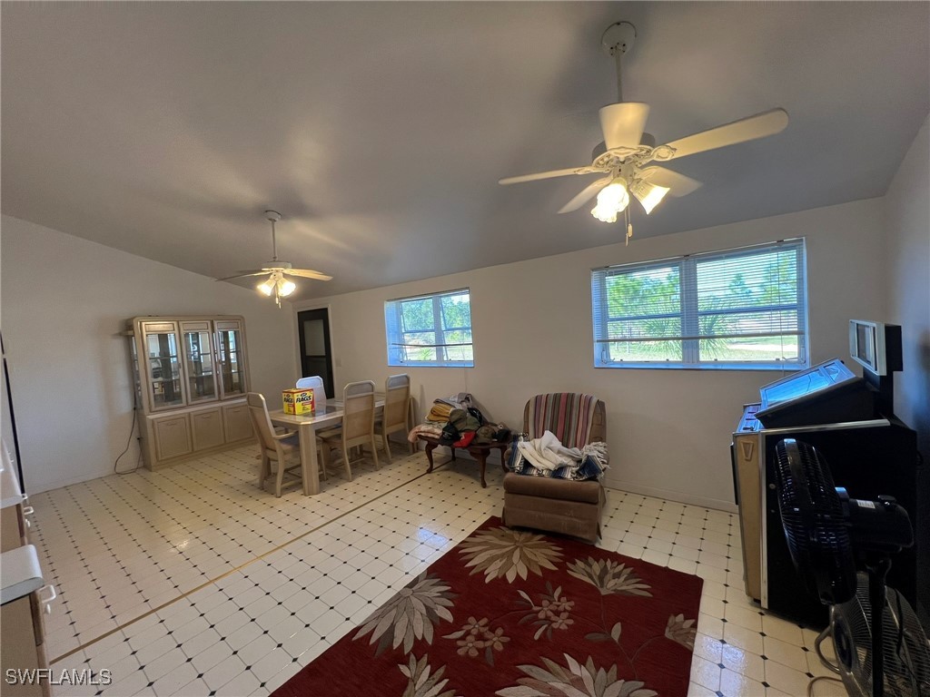 46920 A Bermont Road Punta Gorda, FL 33982 - Photo 32 of 40 a living room with furniture two window and a table
