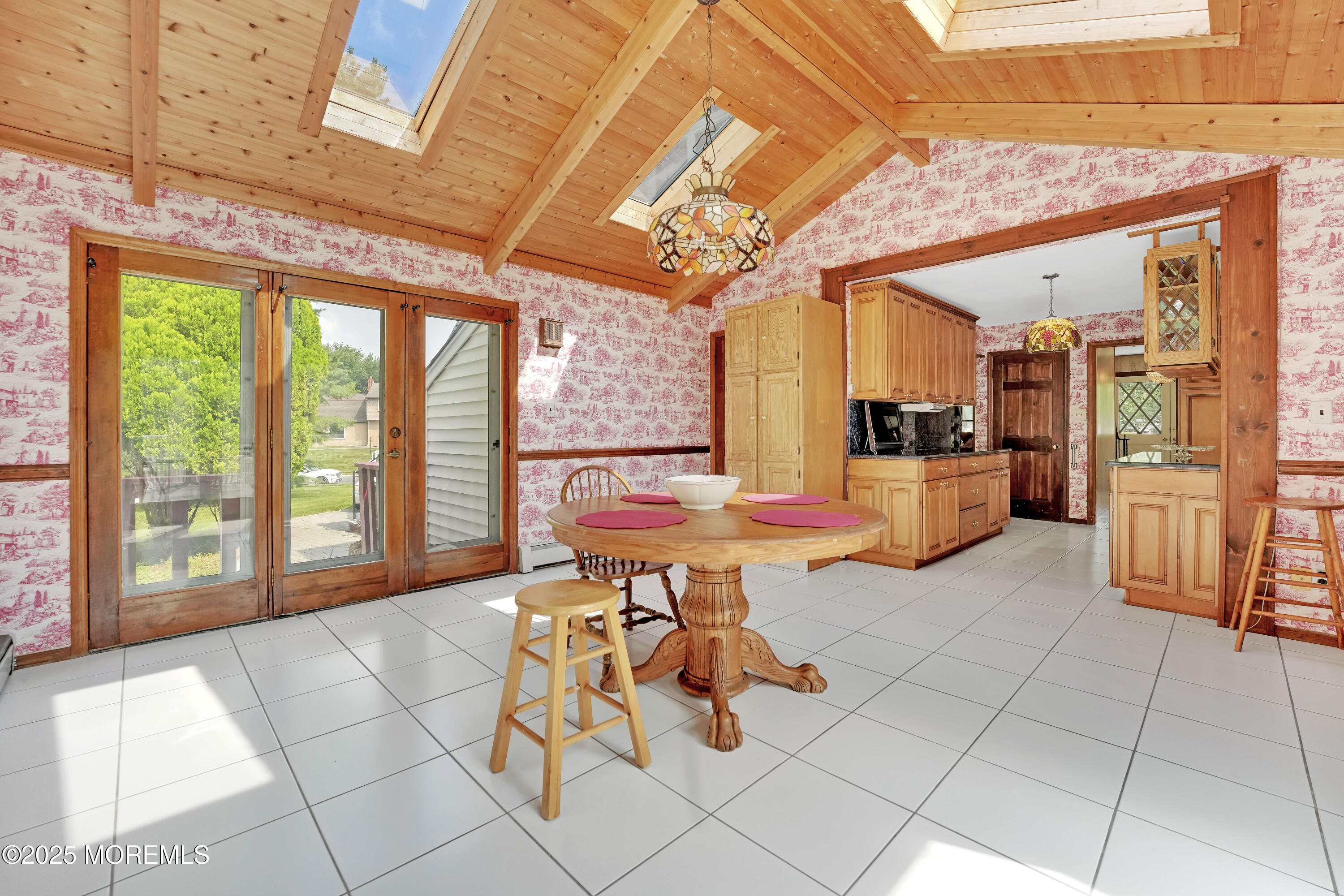 32 Woods Road Freehold, NJ 07728 - Photo 11 of 35 a living room with furniture and a large window