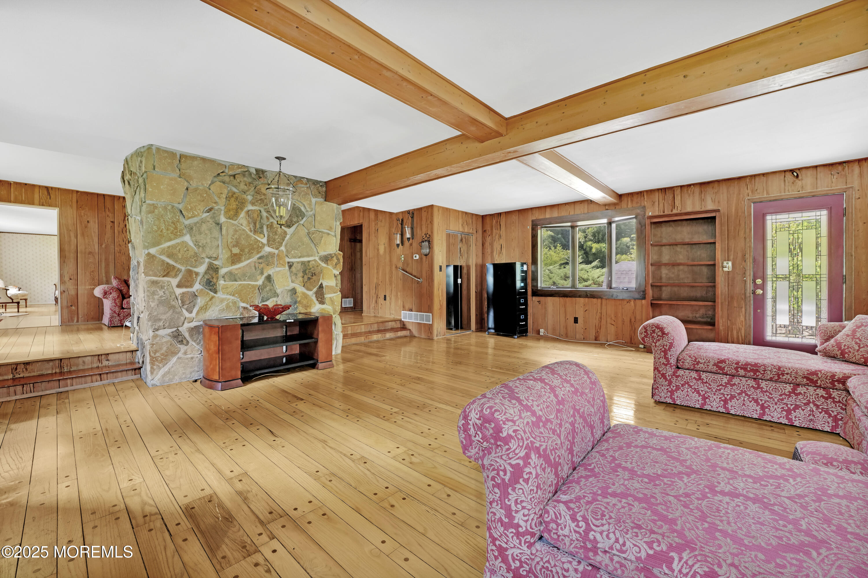 32 Woods Road Freehold, NJ 07728 - Photo 14 of 35 a bed room with furniture and a large window