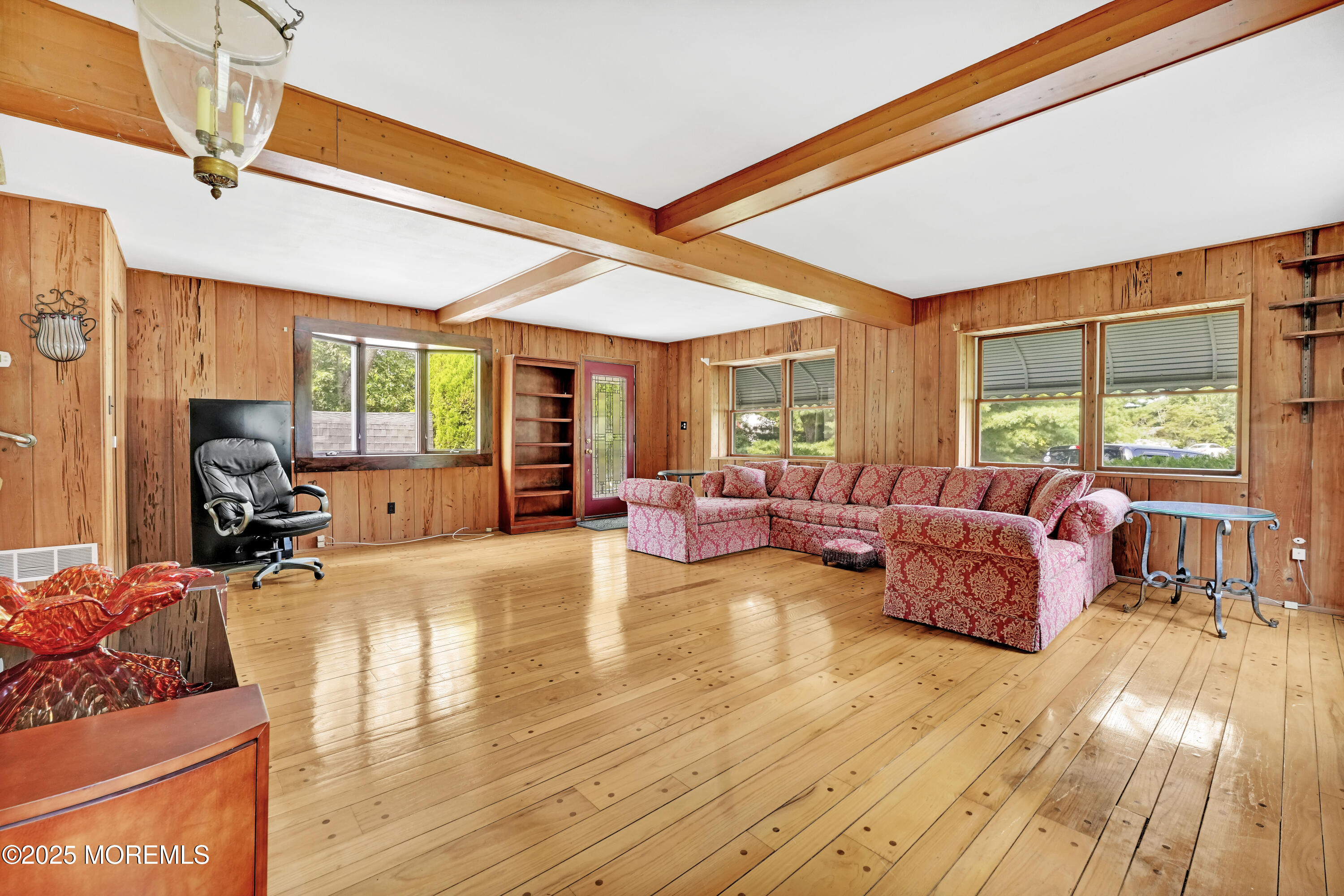 32 Woods Road Freehold, NJ 07728 - Photo 15 of 35 a living room with furniture and a large window