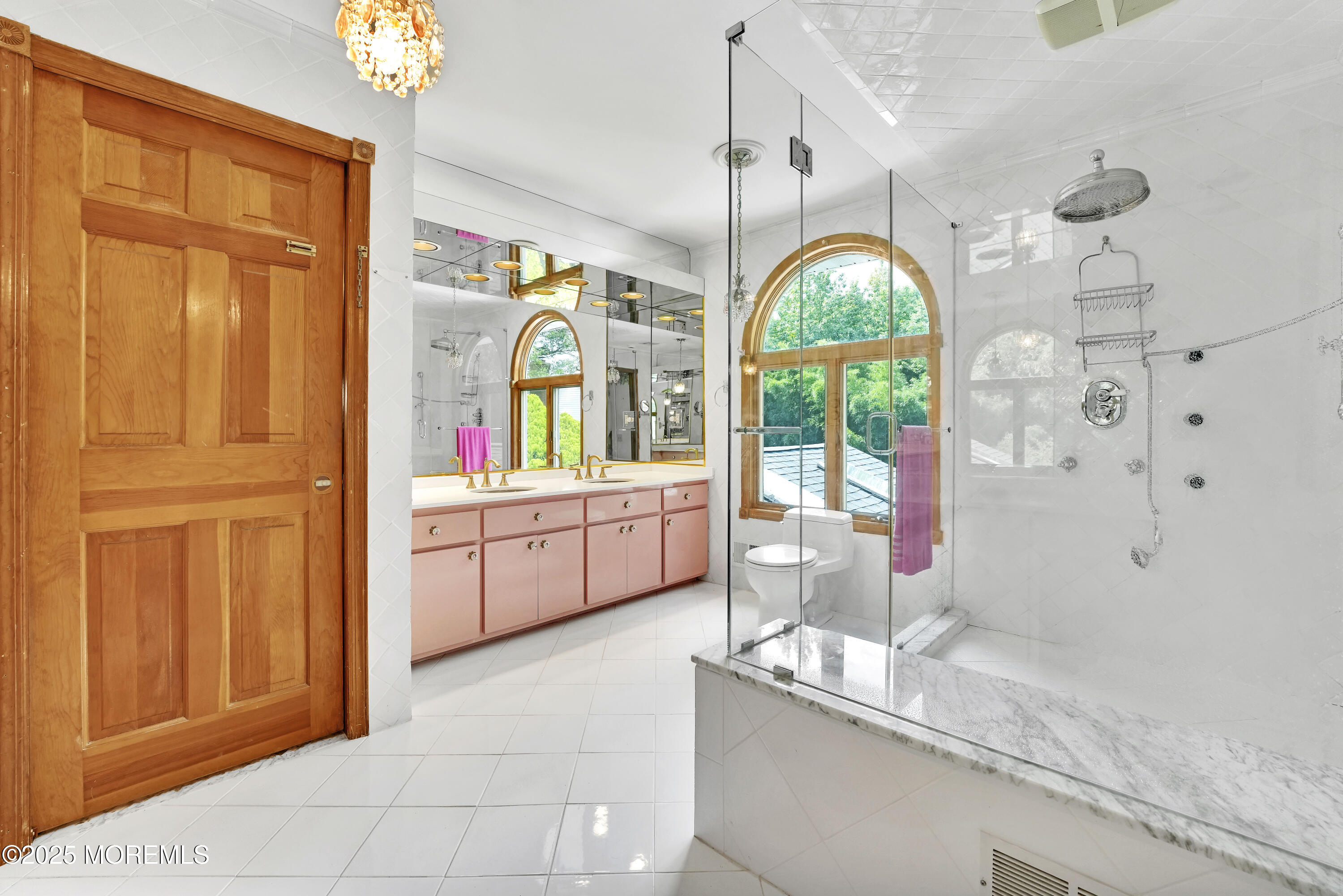32 Woods Road Freehold, NJ 07728 - Photo 20 of 35 a kitchen with stainless steel appliances granite countertop a sink a counter space and a window