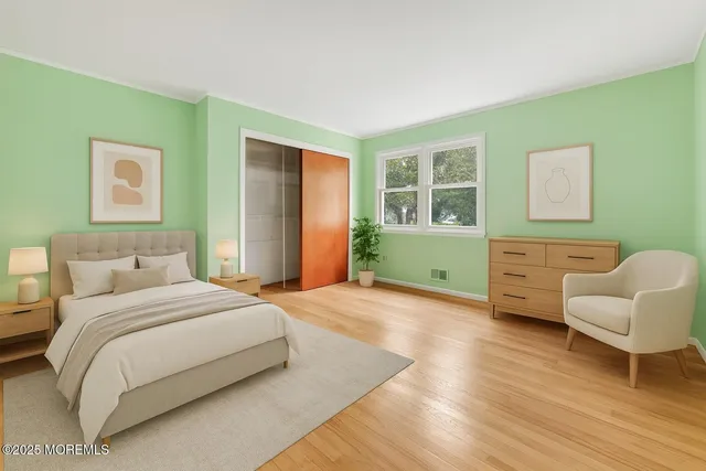 a bedroom with a bed and furniture