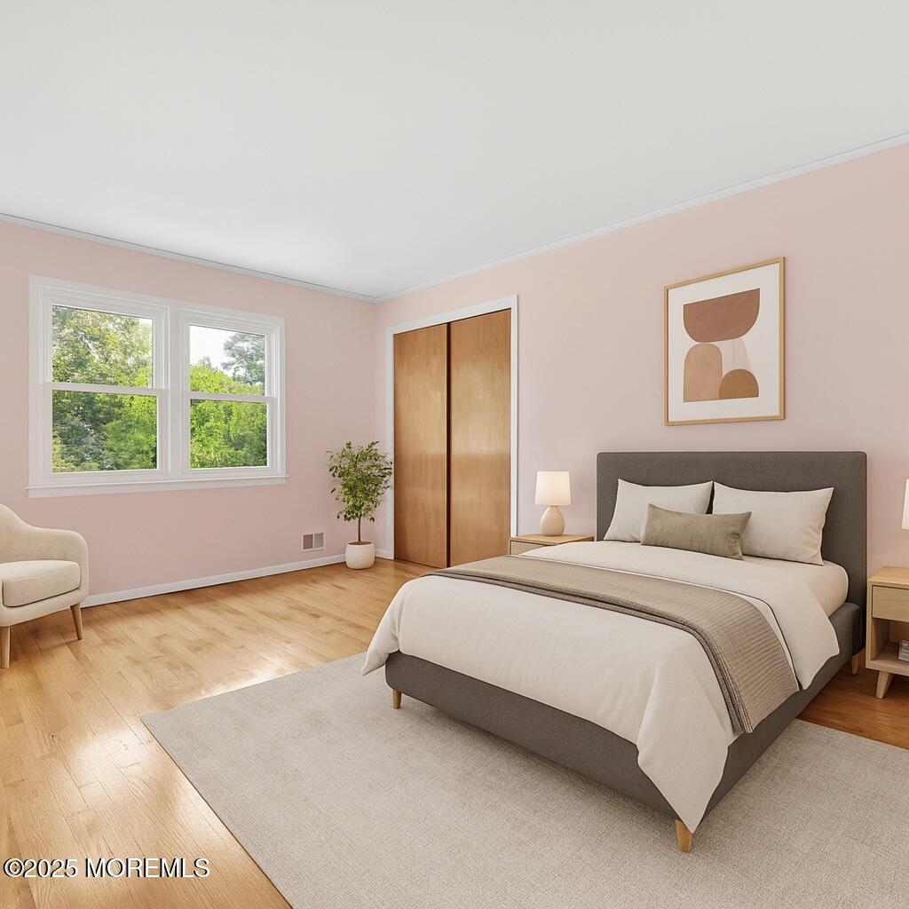 32 Woods Road Freehold, NJ 07728 - Photo 26 of 35 a bedroom with a bed and a window