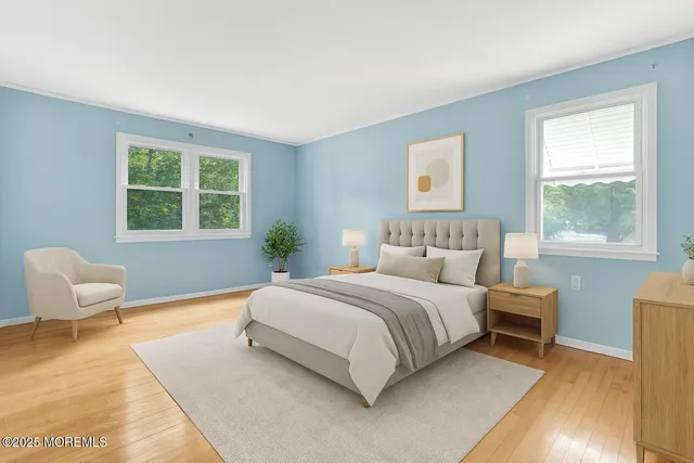 a bedroom with a large bed and a couch