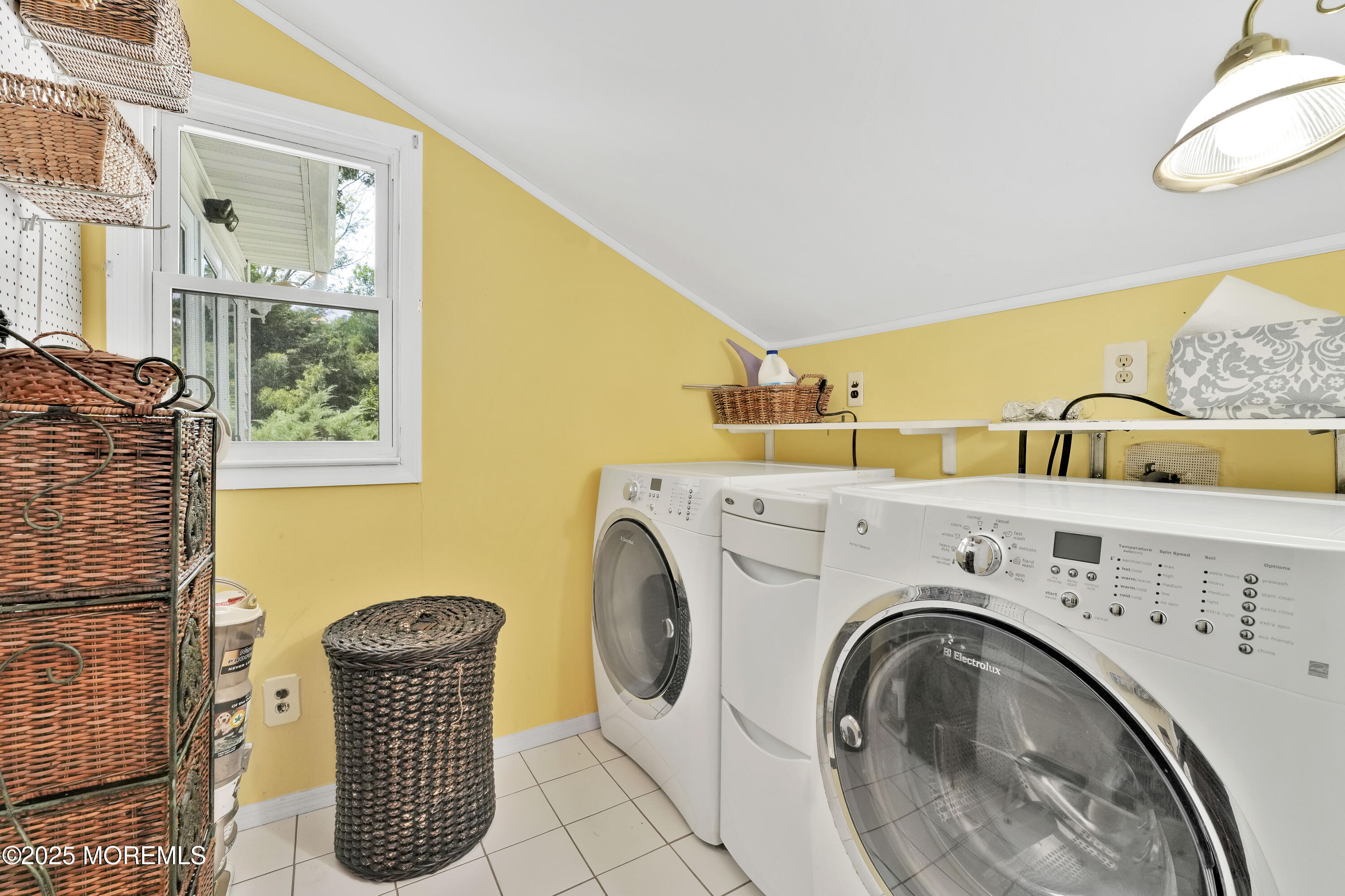 32 Woods Road Freehold, NJ 07728 - Photo 32 of 35 a utility room with dryer and washer