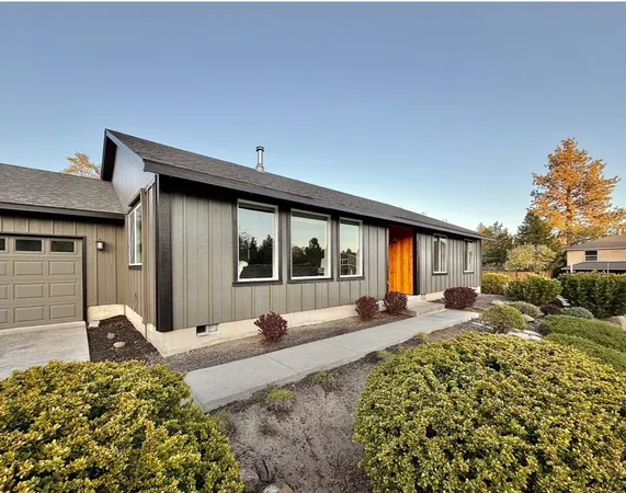 a view of a house with large outdoor space