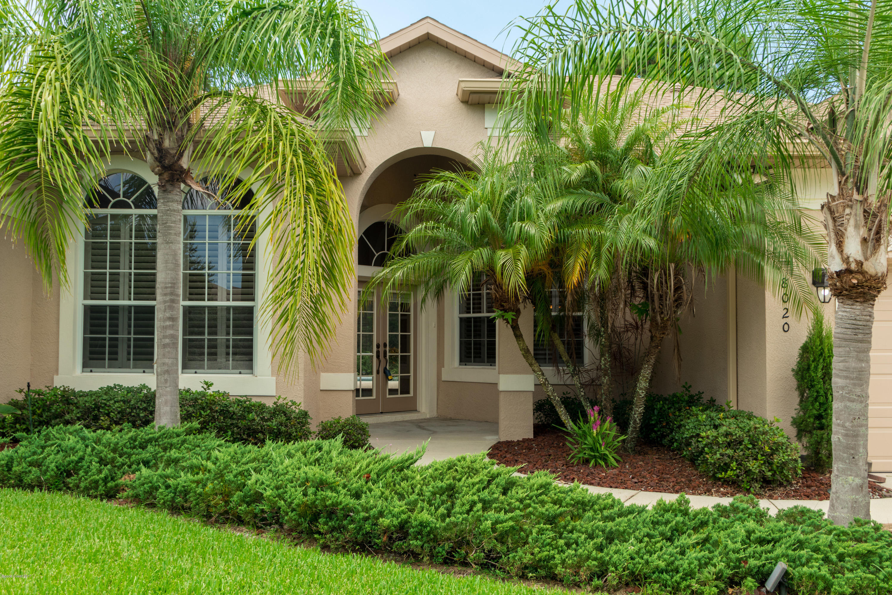 8020 Kingswood Way Melbourne, FL 32940 - Photo 1 of 24 Front