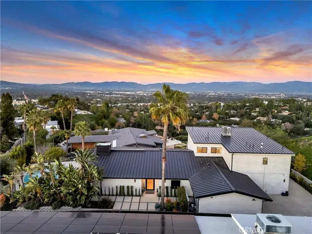 a house view with a garden space
