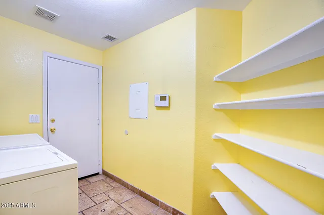 a bathroom with a sink and a shower