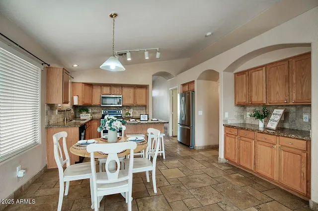 a view of a dining room with furniture